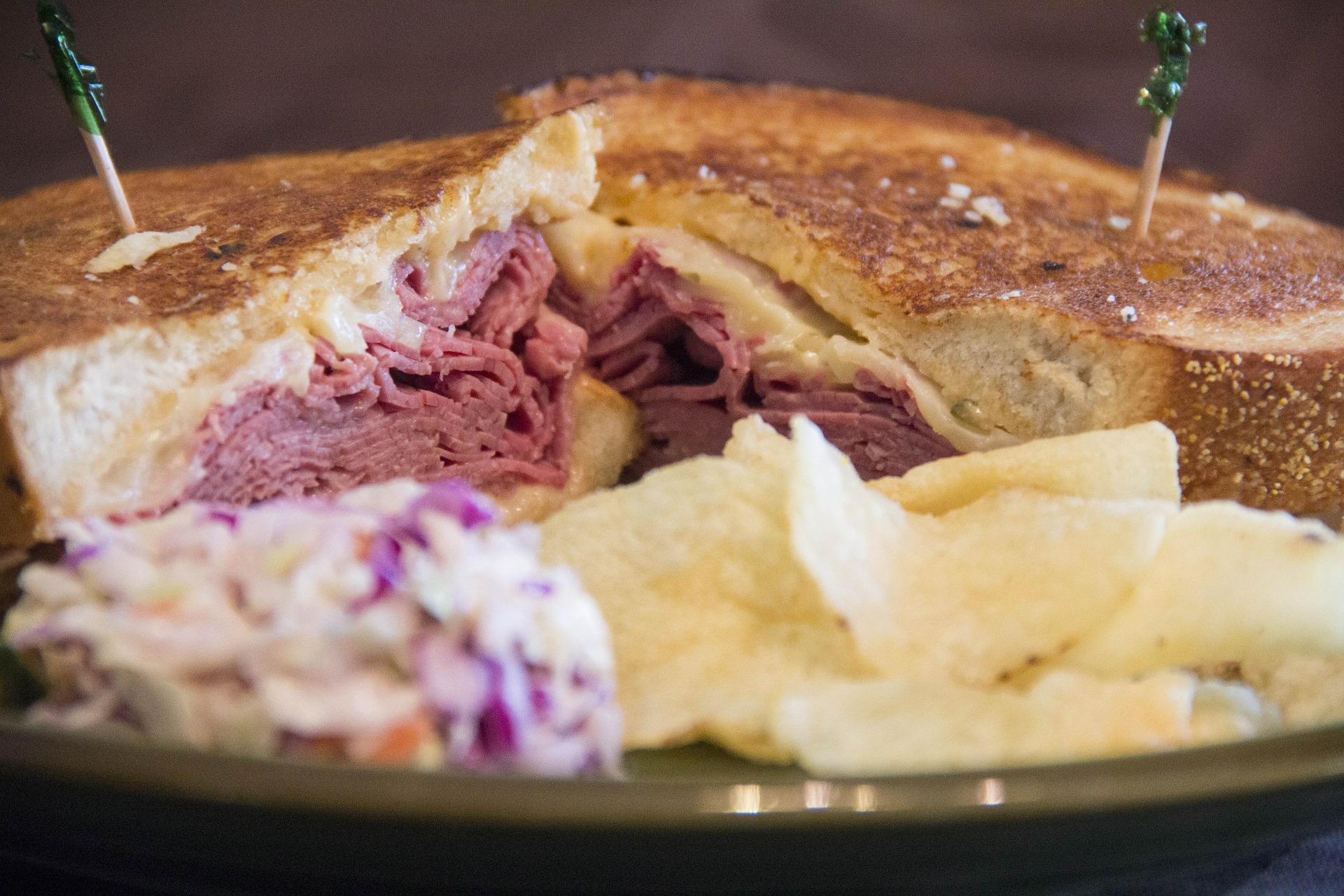 a deli sandwich served with cole slaw and potato chips at Creekside Market and Deli in Jackson Hole