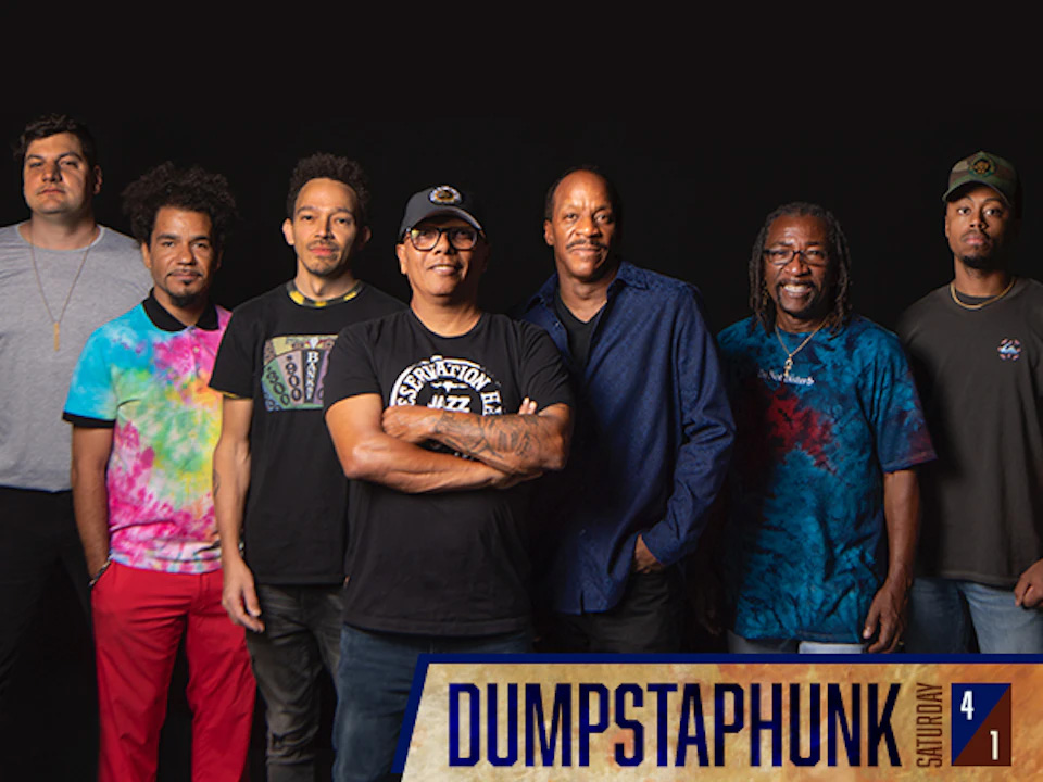 the members of Dumpstaphunk stand side-by-side in a studio