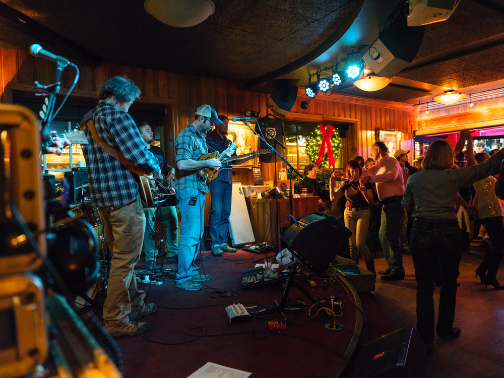 musicians perform for a dancing audience at The Silver Dollar Showroom