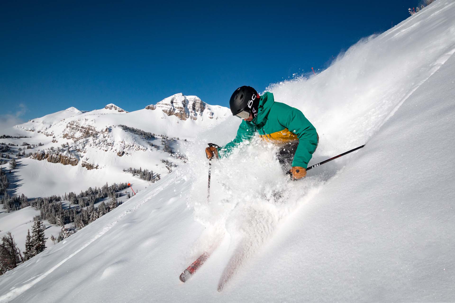 a person skis down the mountain at Jackson Hole Mountain Resort