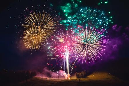 Fireworks exploding in the night sky during 4th of July festivities in Jackson Hole WY